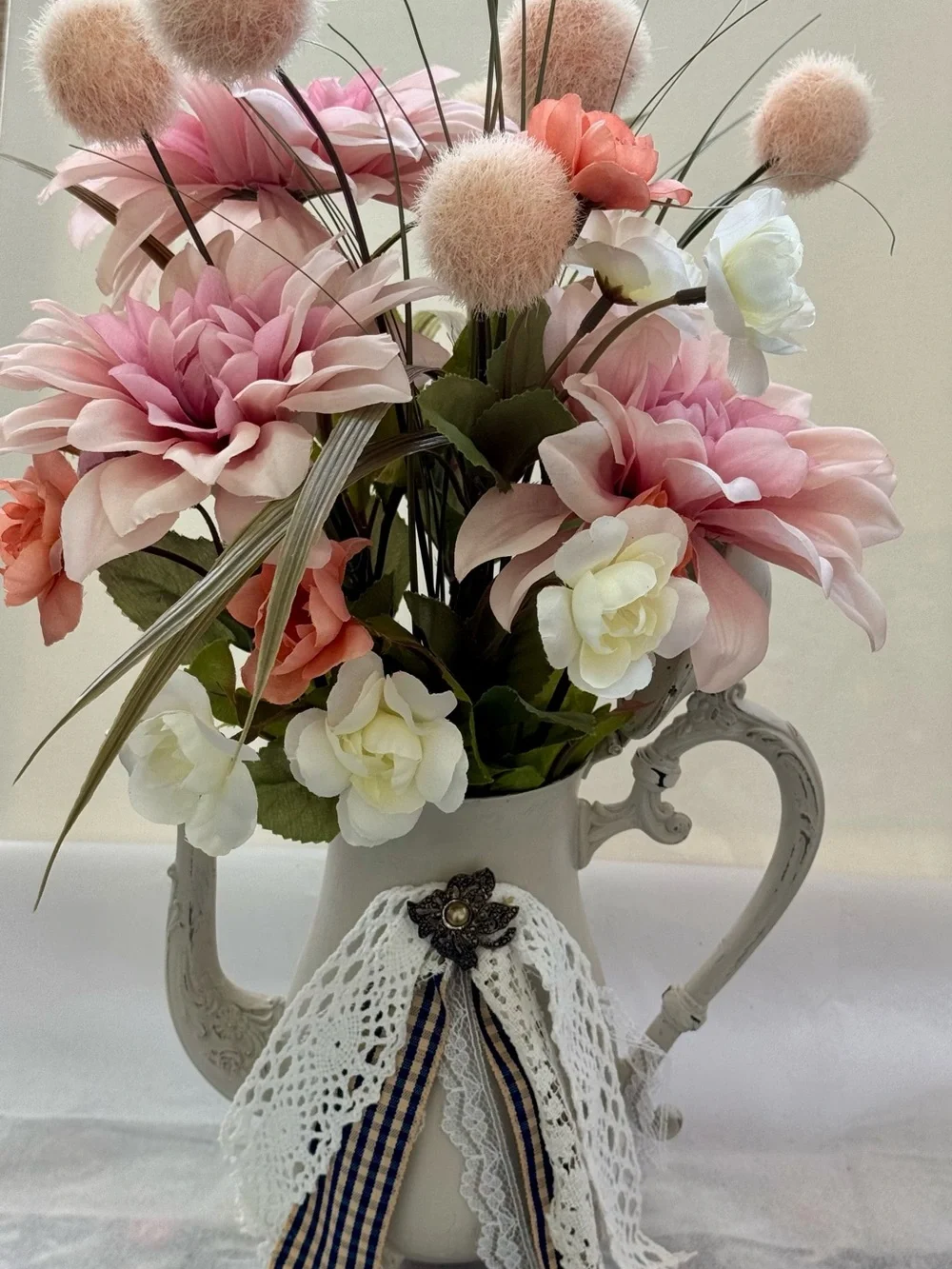 Pink and Cream Artificial Floral Arrangement in Decorative Pitcher By René